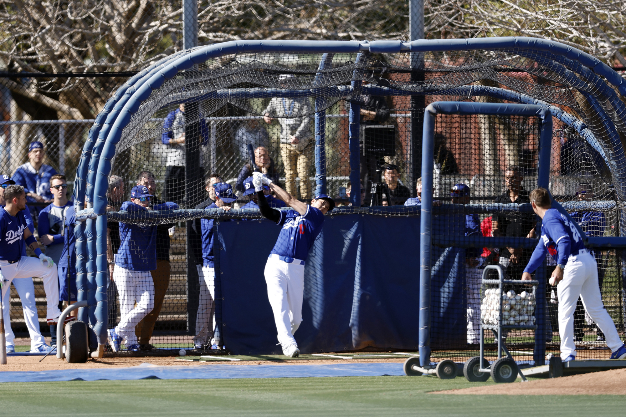 GLENDALE, ARIZONA - FEBRUARY 14: Shohei Ohtani #17 of the Los Angeles Dodgers takes batting practice during workouts at Camelback Ranch on February 14, 2024 in Glendale, Arizona. (Photo by Chris Coduto/Getty Images) 